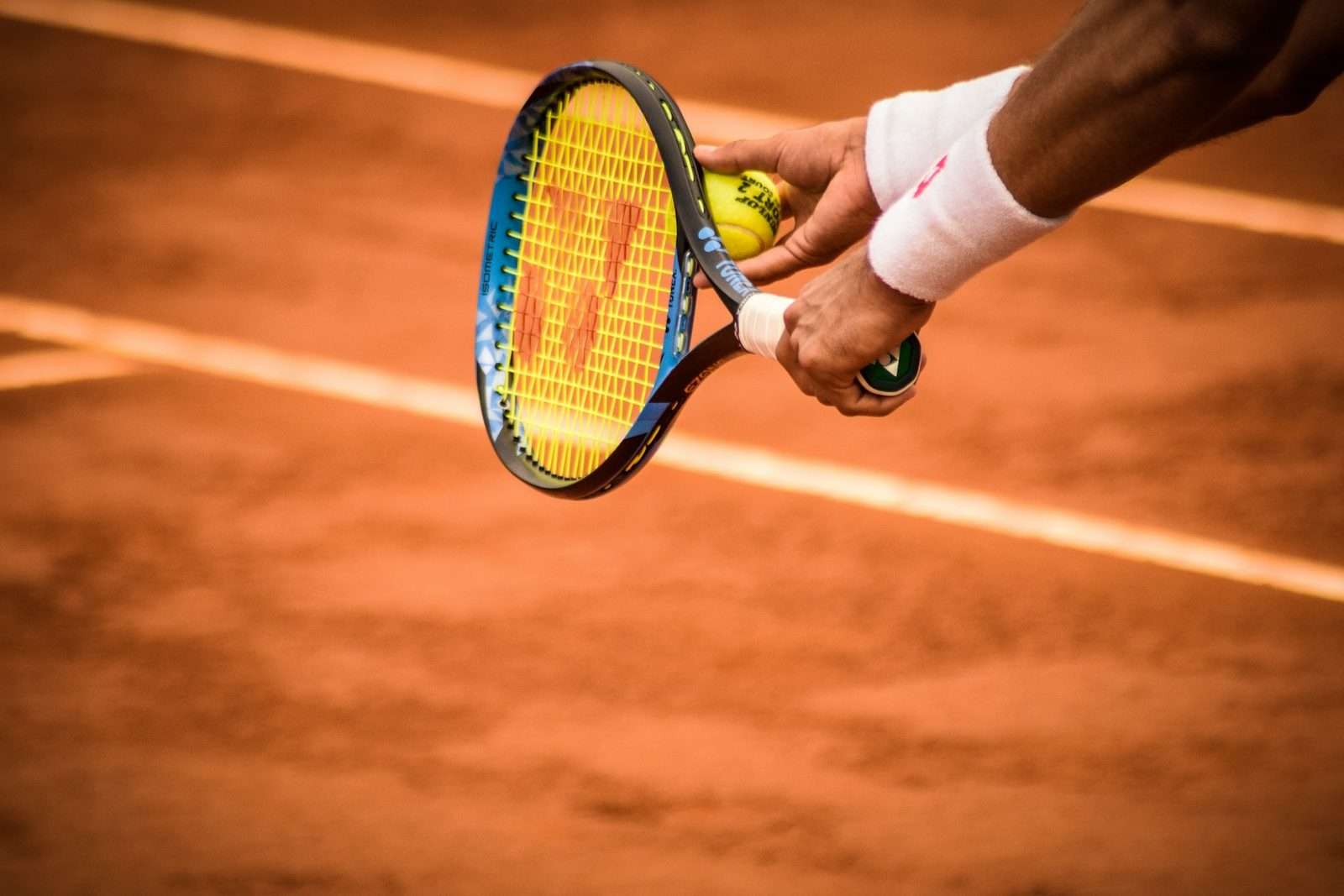Player holding the racquet out in front, the contact position used on the forehand volley